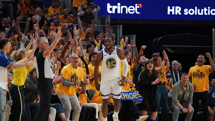 May 10, 2025; San Francisco, California, USA; Golden State Warriors forward Jonathan Kuminga (00) celebrates after scoring against the Minnesota Timberwolves in the third quarter during game three in the second round of the 2025 NBA Playoffs at Chase Center. Mandatory Credit: David Gonzales-Imagn Images