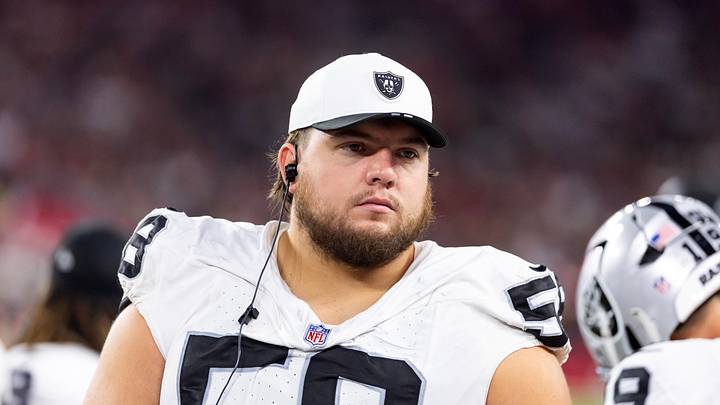 Aug 23, 2025; Glendale, Arizona, USA; Las Vegas Raiders center Jackson Powers-Johnson (58) against the Arizona Cardinals during a preseason NFL game at State Farm Stadium. Mandatory Credit: Mark J. Rebilas-Imagn Images