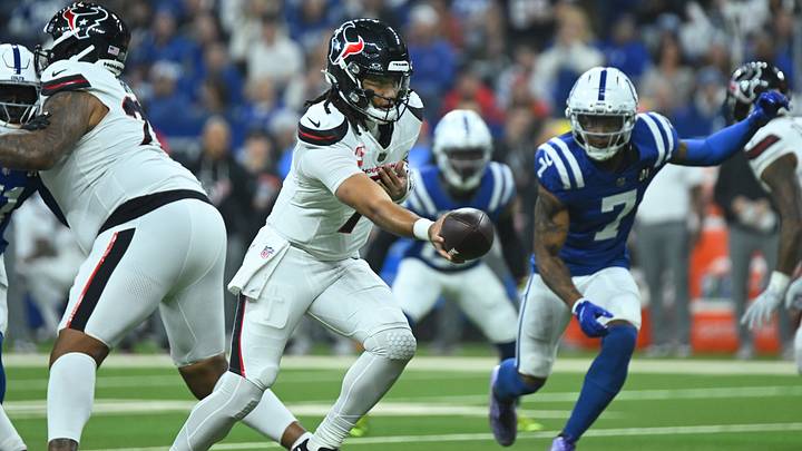 Nov 30, 2025; Indianapolis, Indiana, USA; Houston Texans quarterback C.J. Stroud (7) hands off during the first half against the Indianapolis Colts at Lucas Oil Stadium. Mandatory Credit: Robert Goddin-Imagn Images Nov 30, 2025; Indianapolis, Indiana, USA; Houston Texans quarterback C.J. Stroud (7) hands off during the first half against the Indianapolis Colts at Lucas Oil Stadium. Mandatory Credit: Robert Goddin-Imagn Images