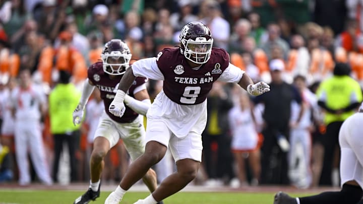 Dec 20, 2025; College Station, TX, USA; Texas A&M Aggies defensive end Cashius Howell (9) rushes the line during the game between the Aggies and the Hurricanes at Kyle Field. Mandatory Credit: Jerome Miron-Imagn Images