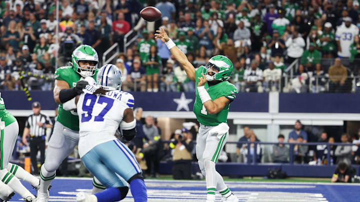 Nov 23, 2025; Arlington, Texas, USA; Philadelphia Eagles quarterback Jalen Hurts (1) throws the ball in the fourth quarter against the Dallas Cowboys at AT&T Stadium. Mandatory Credit: Kevin Jairaj-Imagn Images