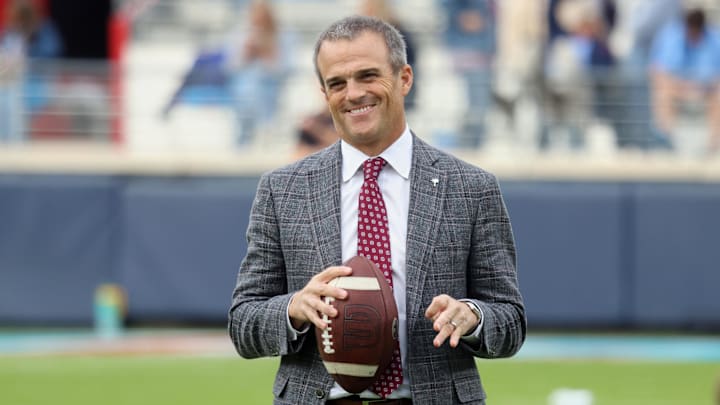 Nov 1, 2025; Oxford, Mississippi, USA; South Carolina Gamecocks head coach Shane Beamer holds a football and reacts on the field before the game against the Mississippi Rebels at Vaught-Hemingway Stadium. Mandatory Credit: Petre Thomas-Imagn Images