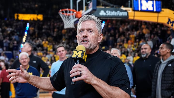 Michigan football head coach Kyle Whittingham speaks as he is being introduced on the floor during the first half between Michigan and USC at Crisler Center in Ann Arbor on Friday, Jan. 2, 2026.