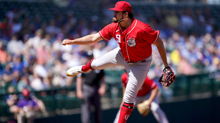 Cincinnati Reds non-roster invitee pitcher Graham Ashcraft follows through on a delivery.