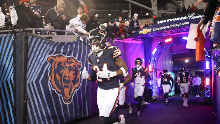 Dec 26, 2024; Chicago, Illinois, USA; Chicago Bears safety Adrian Colbert (24) runs out for warmups prior to a game against the Seattle Seahawks at Soldier Field. 