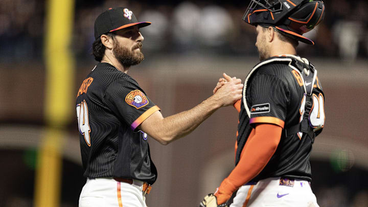 Apr 21, 2026; San Francisco, California, USA; San Francisco Giants pitcher Ryan Walker (74) and catcher Patrick Bailey (14) celebrate their 3-1 victory over the Los Angeles Dodgers at Oracle Park. Mandatory Credit: D. Ross Cameron-Imagn Images