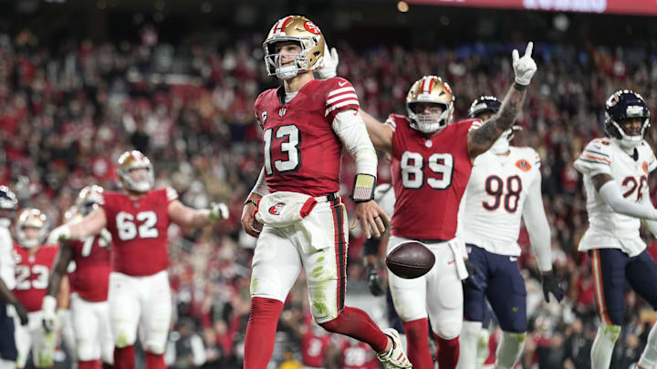 Dec 28, 2025; Santa Clara, California, USA; San Francisco 49ers quarterback Brock Purdy (13) celebrates after scoring a touchdown against the Chicago Bears in the first half at Levi's Stadium. Mandatory Credit: Kyle Terada-Imagn Images