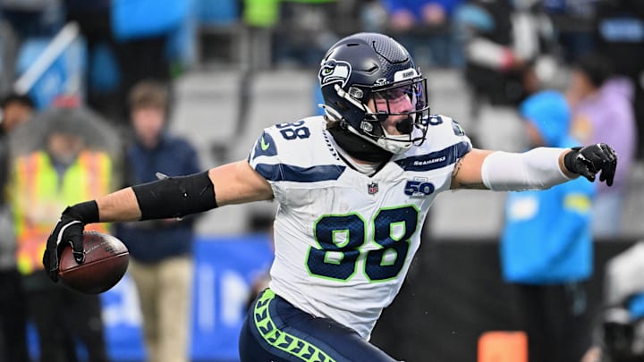 Seattle Seahawks tight end AJ Barner (88) reacts after catching a seventeen-yard touchdown pass thrown by quarterback Sam Darnold (not pictured) against the Carolina Panthers during the third quarter at Bank of America Stadium. 