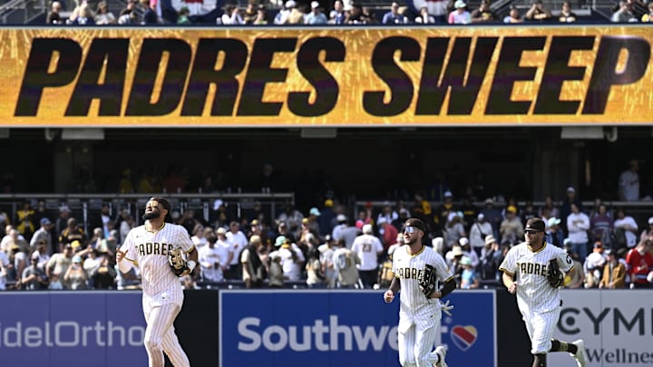 Apr 2, 2025; San Diego, California, USA; San Diego Padres right fielder Fernando Tatis Jr. (23), left, Jackson Merrill (3), center and Brandon Lockridge (28) celebrate after the Padres beat the Cleveland Guardians 5-2 at Petco Park. Mandatory Credit: Denis Poroy-Imagn Images