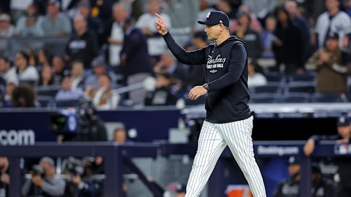 Oct 8, 2025; Bronx, New York, USA; New York Yankees manager Aaron Boone signals to the bullpen during the seventh inning against the Toronto Blue Jays during game four of the ALDS round for the 2025 MLB playoffs at Yankee Stadium. Mandatory Credit: Brad Penner-Imagn Images Oct 8, 2025; Bronx, New York, USA; New York Yankees manager Aaron Boone signals to the bullpen during the seventh inning against the Toronto Blue Jays during game four of the ALDS round for the 2025 MLB playoffs at Yankee Stadium. Mandatory Credit: Brad Penner-Imagn Images