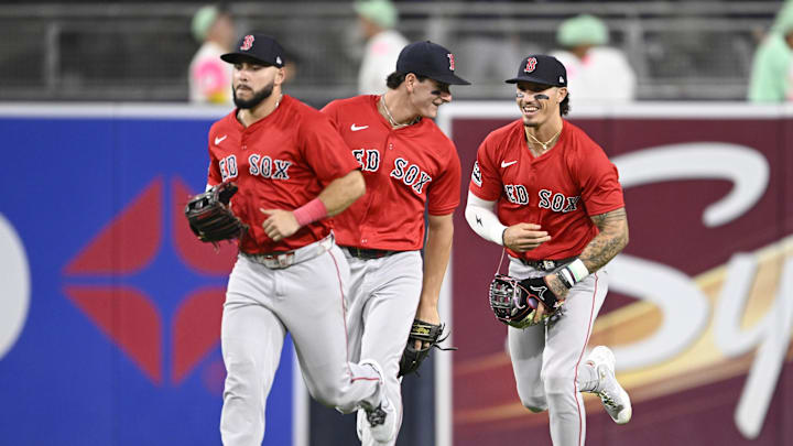 Aug 8, 2025; San Diego, California, USA; Boston Red Sox right fielder Wilyer Abreu (52), left, Roman Anthony (19), center, and Jarren Duran (16) celebrate after the Red Sox beat the San Diego Padres at Petco Park. Mandatory Credit: Denis Poroy-Imagn Images