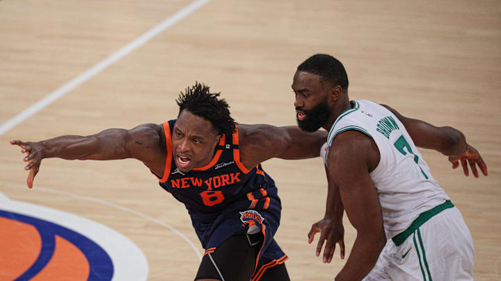 May 12, 2025; New York, New York, USA; New York Knicks forward OG Anunoby (8) is fouled by Boston Celtics guard Jaylen Brown (7) in the second half during game four of the second round for the 2025 NBA Playoffs at Madison Square Garden. Mandatory Credit: Vincent Carchietta-Imagn Images