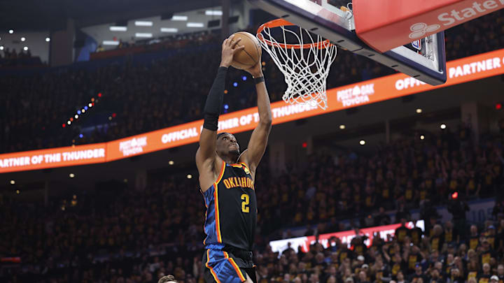 May 5, 2025; Oklahoma City, Oklahoma, USA; Oklahoma City Thunder guard Shai Gilgeous-Alexander (2) dunks against the Denver Nuggets during the second half in game one of the second round for the 2025 NBA Playoffs at Paycom Center. Mandatory Credit: Alonzo Adams-Imagn Images