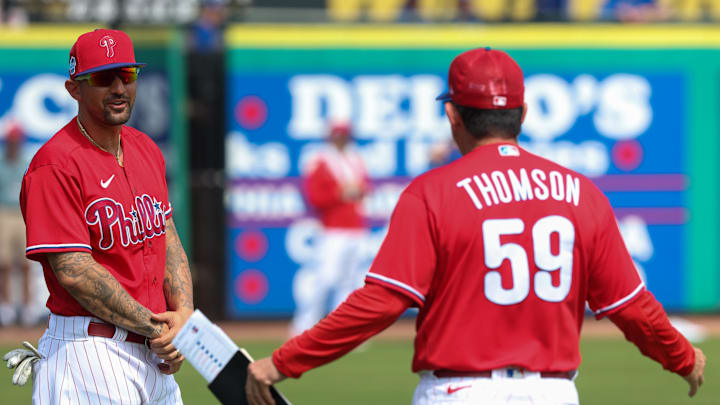 Feb 28, 2023; Clearwater, Florida, USA; Philadelphia Phillies right fielder Nick Castellanos (8) talks to manager Rob Thomson (59) before a game against the Toronto Blue Jays during spring training at BayCare Ballpark. Mandatory Credit: Nathan Ray Seebeck-Imagn Images Feb 28, 2023; Clearwater, Florida, USA; Philadelphia Phillies right fielder Nick Castellanos (8) talks to manager Rob Thomson (59) before a game against the Toronto Blue Jays during spring training at BayCare Ballpark. Mandatory Credit: Nathan Ray Seebeck-Imagn Images
