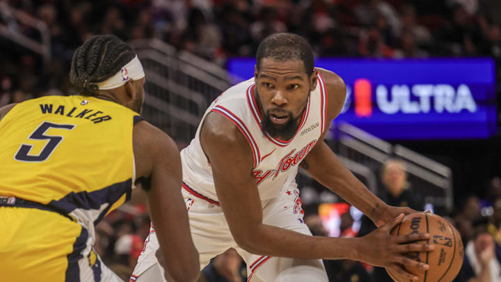 Dec 29, 2025; Houston, Texas, USA; Houston Rockets forward Kevin Durant (7) is guarded by Indiana Pacers forward Jarace Walker (5) in the third quarter at Toyota Center. Mandatory Credit: Thomas Shea-Imagn Images