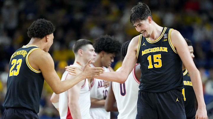 Michigan Wolverines center Aday Mara (15) and forward Yaxel Lendeborg (23) celebrate a made basket Saturday, April 4, 2026, during a Final Four game against the Arizona Wildcats at Lucas Oil Stadium in Indianapolis. Michigan Wolverines center Aday Mara (15) and forward Yaxel Lendeborg (23) celebrate a made basket Saturday, April 4, 2026, during a Final Four game against the Arizona Wildcats at Lucas Oil Stadium in Indianapolis.