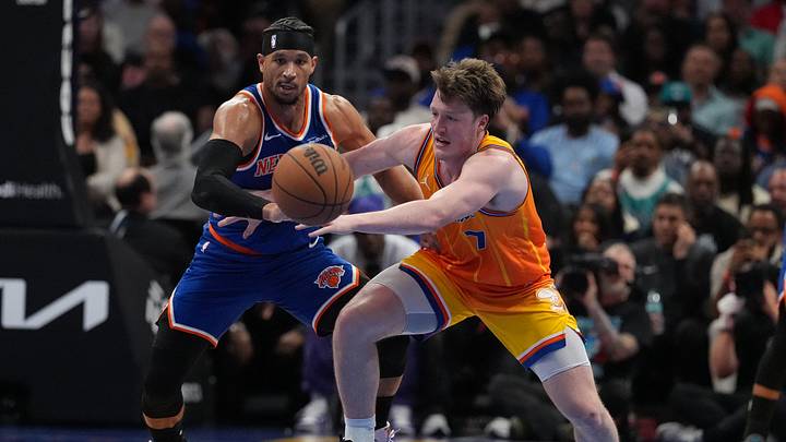 Charlotte Hornets guard/forward Kon Knueppel (7) fights for possession with New York Knicks guard Josh Hart 