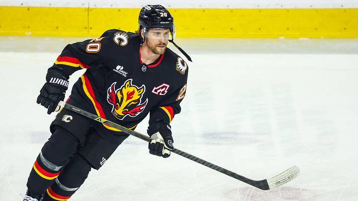 Mar 7, 2026; Calgary, Alberta, CAN; Calgary Flames left wing Blake Coleman (20) skates during the warmup period against the Carolina Hurricanes at Scotiabank Saddledome. Mandatory Credit: Sergei Belski-Imagn Images