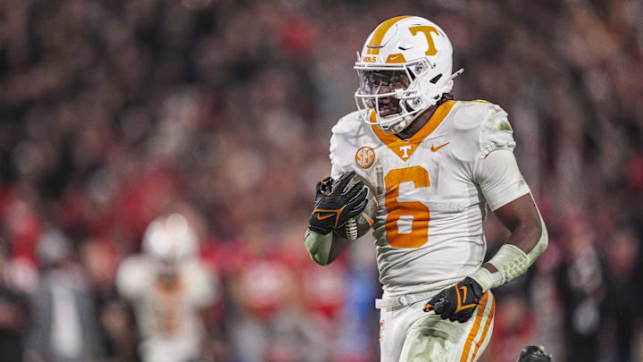 Nov 16, 2024; Athens, Georgia, USA; Tennessee Volunteers running back Dylan Sampson (6) runs for a touchdown against the Georgia Bulldogs during the first half at Sanford Stadium. Mandatory Credit: Dale Zanine-Imagn Images