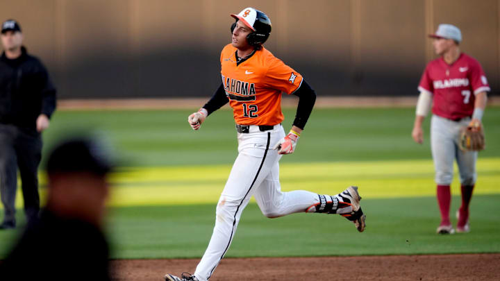Oklahoma infielder Ryley Leininger (12) runs the bases after hitting a home run in the fourth inning of a college Bedlam baseball game between the University of Oklahoma Sooners (OU) and the Oklahoma State University Cowboys (OSU) at O'Brate Stadium in Stillwater, Okla., Tuesday, April 15, 2025.