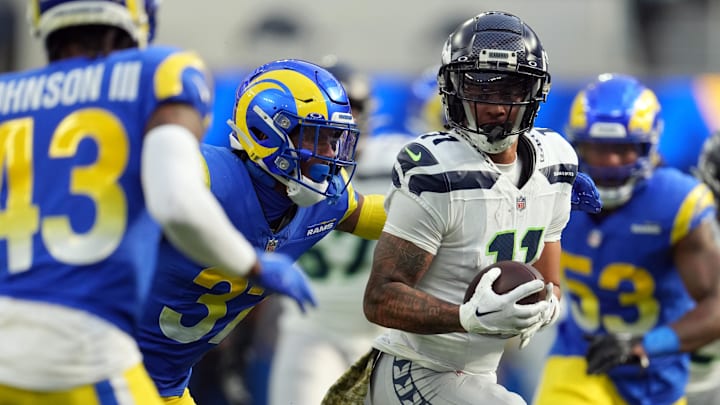 Nov 19, 2023; Inglewood, California, USA; Seattle Seahawks wide receiver Jaxon Smith-Njigba (11) runs against Los Angeles Rams safety Quentin Lake (37) in the first quarter at SoFi Stadium. Mandatory Credit: Kirby Lee-Imagn Images Nov 19, 2023; Inglewood, California, USA; Seattle Seahawks wide receiver Jaxon Smith-Njigba (11) runs against Los Angeles Rams safety Quentin Lake (37) in the first quarter at SoFi Stadium. Mandatory Credit: Kirby Lee-Imagn Images