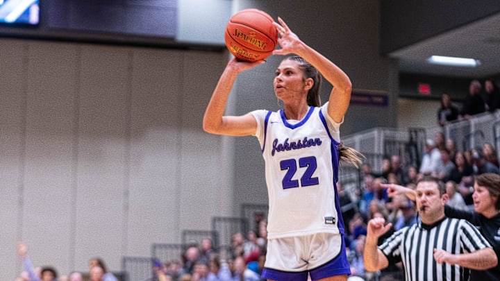 Johnston's Kelli Kalb (22) shoots a three-pointer against Dowling Catholic on Dec. 16, 2025, at Johnston High School.