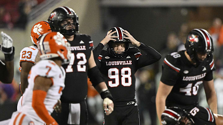 Nov 14, 2025; Louisville, Kentucky, USA;  Louisville Cardinals kicker Nick Keller (98) reacts after missing a field goal attempt during the second half against the Clemson Tigers at L&N Federal Credit Union Stadium. Clemson defeated Louisville 20-19. Mandatory Credit: Jamie Rhodes-Imagn Images