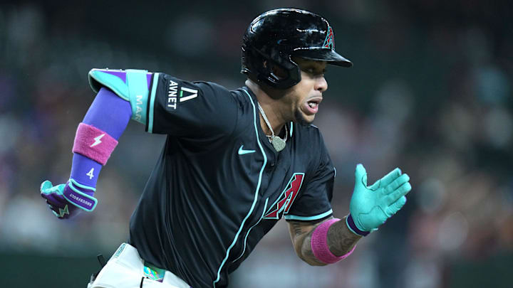 Arizona Diamondbacks' Ketel Marte (4) takes off down the base path after hitting a double against the Cleveland Guardians at Chase Field on Aug. 19, 2025.