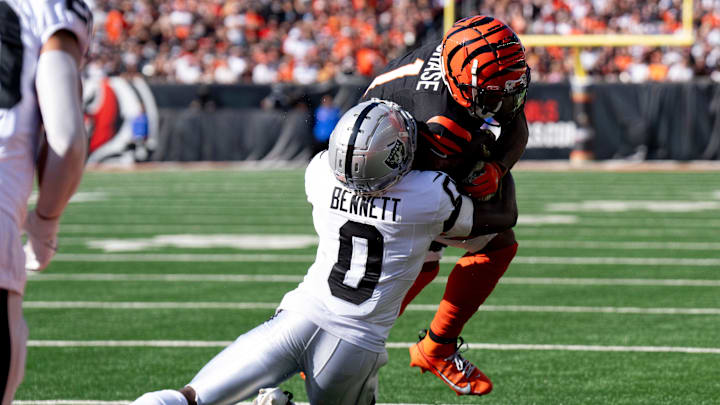 Las Vegas Raiders corner back Jakorian Bennett (0) tackles Cincinnati Bengals wide receiver Ja'Marr Chase (1) at the 1-yard-line in the first quarter of the NFL game at Paycor Stadium in Cincinnati on Sunday, Nov. 3, 2024.