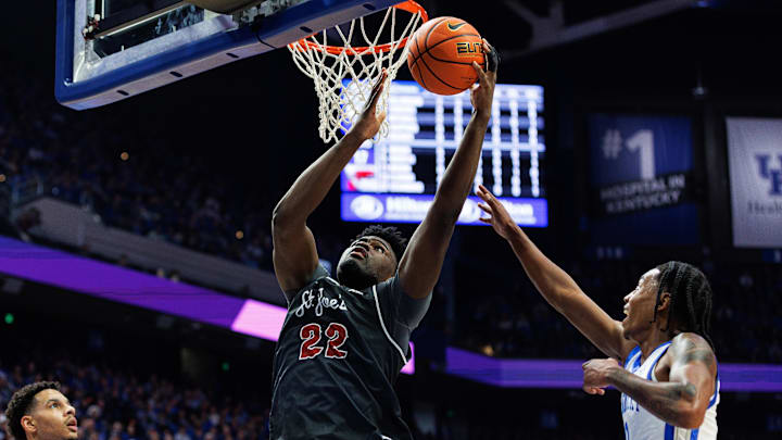 Nov 20, 2023; Lexington, Kentucky, USA; Saint Joseph's Hawks center Christ Essandoko (22) drives to