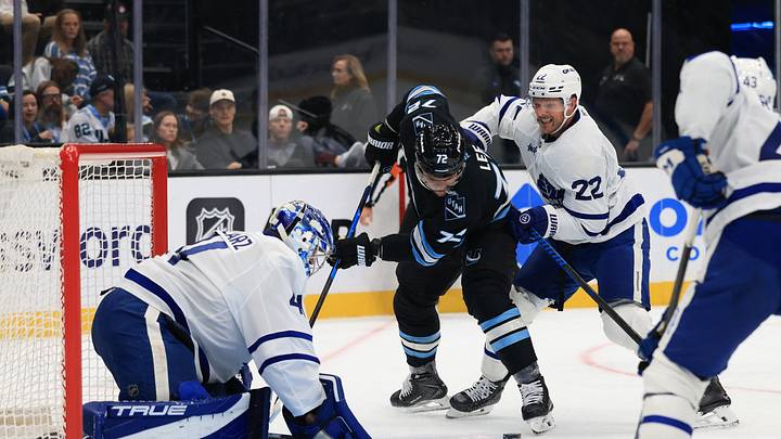 Oct 13, 2026; Salt Lake City, Utah, USA; Utah Mammoth left wing Anders Lee (72) plays the puck against Toronto Maple Leafs goaltender Anthony Stolarz (41) and defenseman Jake McCabe (22) during the second period at Delta Center. Mandatory Credit: Rob Gray-Imagn Images Oct 13, 2026; Salt Lake City, Utah, USA; Utah Mammoth left wing Anders Lee (72) plays the puck against Toronto Maple Leafs goaltender Anthony Stolarz (41) and defenseman Jake McCabe (22) during the second period at Delta Center. Mandatory Credit: Rob Gray-Imagn Images