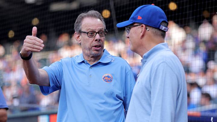 Aug 14, 2025; New York City, New York, USA; New York Mets radio broadcaster Howie Rose (left) talks to team owner Steve Cohen on the field before a ceremony to honor first baseman Pete Alonso (not pictured) for breaking the Mets all time home run record before a game against the Atlanta Braves at Citi Field. Mandatory Credit: Brad Penner-Imagn Images
