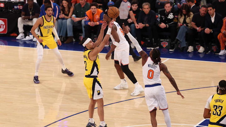 May 29, 2025; New York, New York, USA; Indiana Pacers guard Andrew Nembhard (2) shoots against New York Knicks guard Delon Wright (0) in the second quarter during game five of the eastern conference finals for the 2025 NBA Playoffs at Madison Square Garden. Mandatory Credit: Vincent Carchietta-Imagn Images