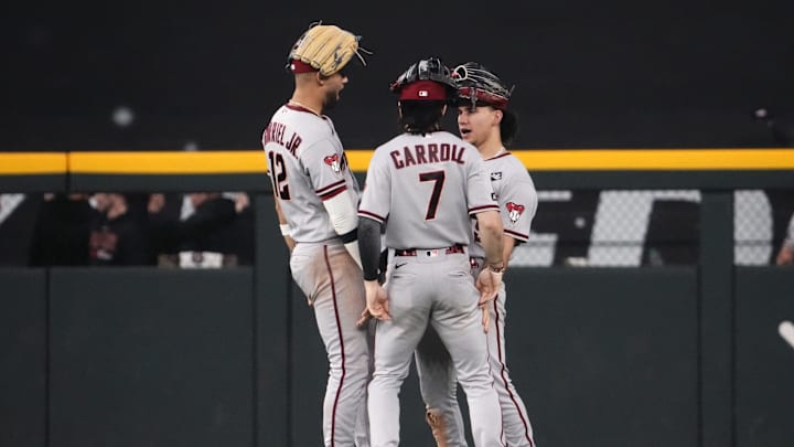 Arizona Diamondbacks left fielder Lourdes Gurriel Jr. (12) celebrates with right fielder Corbin Carroll (7) and center fielder Alek Thomas (5) after defeating the Texas Rangers in game two of the 2023 World Series at Globe Life Field on Oct. 28, 2023, in Arlington, Texas. Arizona Diamondbacks left fielder Lourdes Gurriel Jr. (12) celebrates with right fielder Corbin Carroll (7) and center fielder Alek Thomas (5) after defeating the Texas Rangers in game two of the 2023 World Series at Globe Life Field on Oct. 28, 2023, in Arlington, Texas.