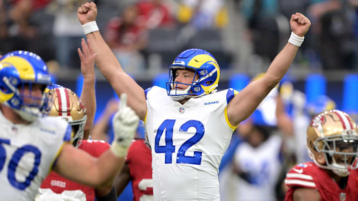 Sep 22, 2024; Inglewood, California, USA;  Los Angeles Rams punter Ethan Evans (42) celebrates after scoring the game winning field goal in the fourth quarter against the San Francisco 49ers at SoFi Stadium. Mandatory Credit: Jayne Kamin-Oncea-Imagn Images