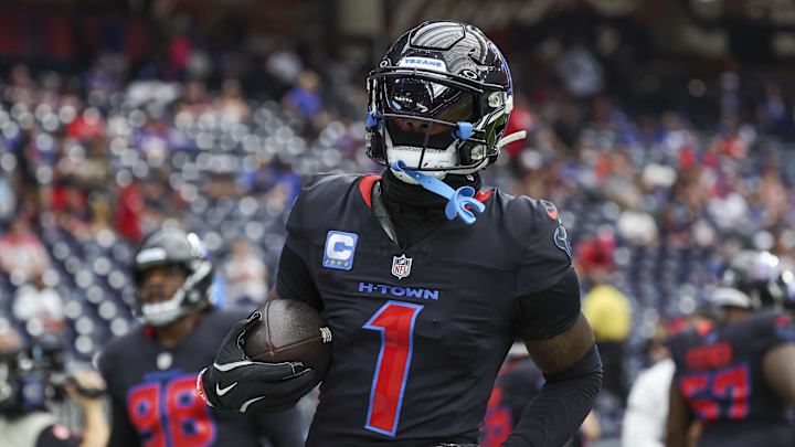 Oct 6, 2024; Houston, Texas, USA; Houston Texans wide receiver Stefon Diggs (1) warms up before the game against the Buffalo Bills at NRG Stadium. Mandatory Credit: Troy Taormina-Imagn Images