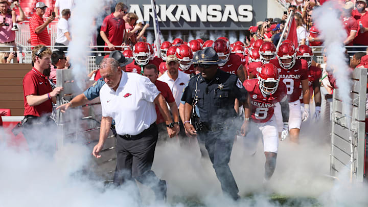 Sep 14, 2024; Fayetteville, Arkansas, USA; Arkansas Razorbacks head coach Sam Pittman leads his team onto the field prior to the game against the UAB Blazers at Donald W. Reynolds Razorback Stadium. Mandatory Credit: Nelson Chenault-Imagn Images