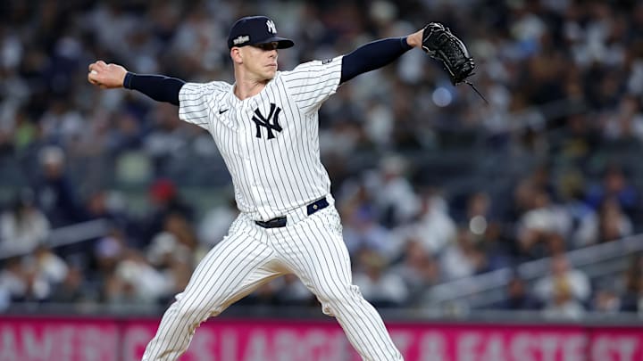 Oct 7, 2024; Bronx, New York, USA;  New York Yankees pitcher Ian Hamilton (71) throws a pitch against the Kansas City Royals in the fourth inning during game two of the ALDS for the 2024 MLB Playoffs at Yankee Stadium. Mandatory Credit: Brad Penner-Imagn Images