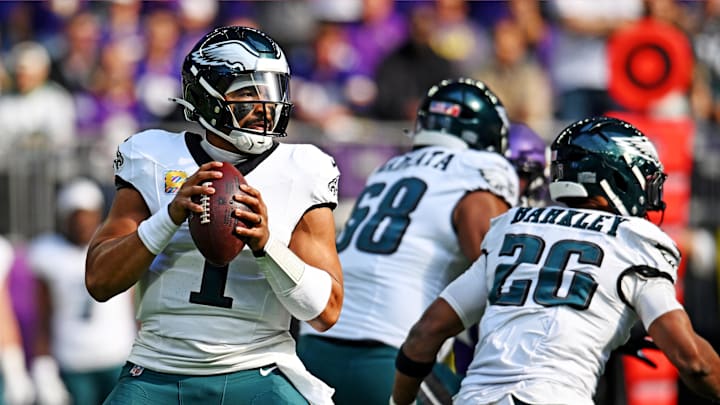 Oct 19, 2025; Minneapolis, Minnesota, USA; Philadelphia Eagles quarterback Jalen Hurts (1) runs the ball during the first half against the Minnesota Vikings at U.S. Bank Stadium.  