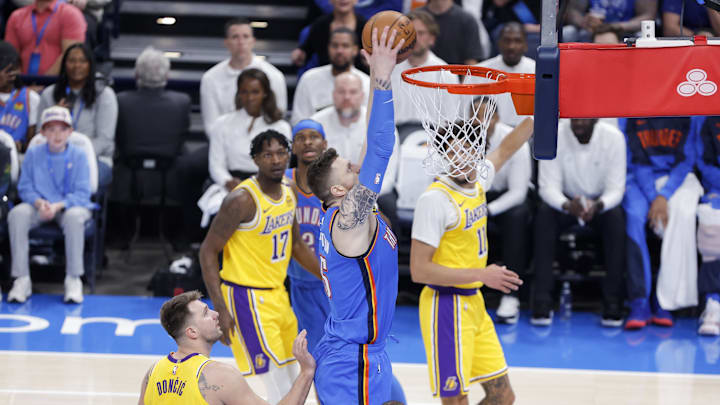 Apr 8, 2025; Oklahoma City, Oklahoma, USA; Oklahoma City Thunder center Isaiah Hartenstein (55) goes up for a dunk against the Los Angeles Lakers during the first quarter at Paycom Center. Mandatory Credit: Alonzo Adams-Imagn Images Apr 8, 2025; Oklahoma City, Oklahoma, USA; Oklahoma City Thunder center Isaiah Hartenstein (55) goes up for a dunk against the Los Angeles Lakers during the first quarter at Paycom Center. Mandatory Credit: Alonzo Adams-Imagn Images