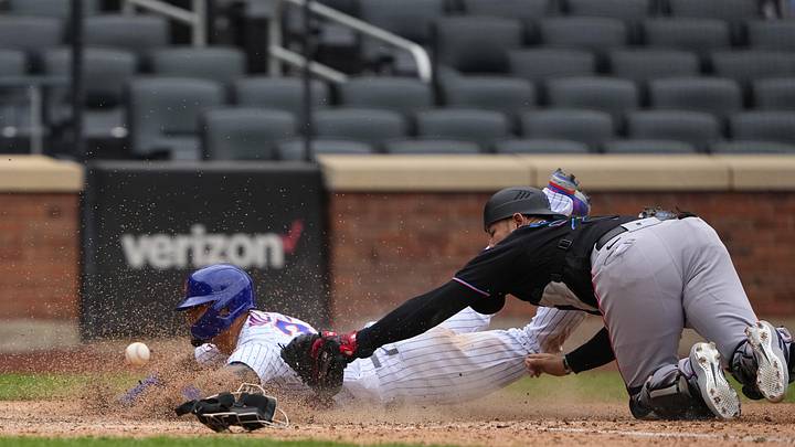 Aug 31, 2021; New York City, New York, USA; New York Mets second baseman Javier Baez (23) scores the game winning run ahead of the throw during the ninth inning against the Miami Marlins at Citi Field. Mandatory Credit: Gregory Fisher-Imagn Images Aug 31, 2021; New York City, New York, USA; New York Mets second baseman Javier Baez (23) scores the game winning run ahead of the throw during the ninth inning against the Miami Marlins at Citi Field. Mandatory Credit: Gregory Fisher-Imagn Images