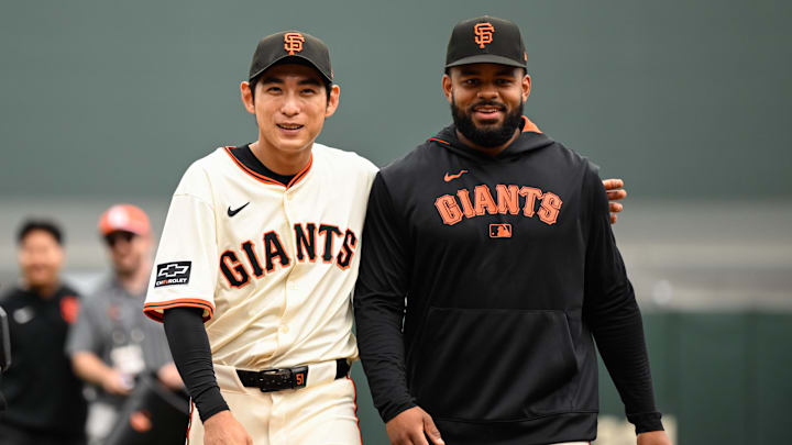 Sep 28, 2025; San Francisco, California, USA;  San Francisco Giants center fielder Jung Hoo Lee (51) and left fielder Heliot Ramos (17) walk off the field after the game against the Colorado Rockies at Oracle Park. Mandatory Credit: Eakin Howard-Imagn Images