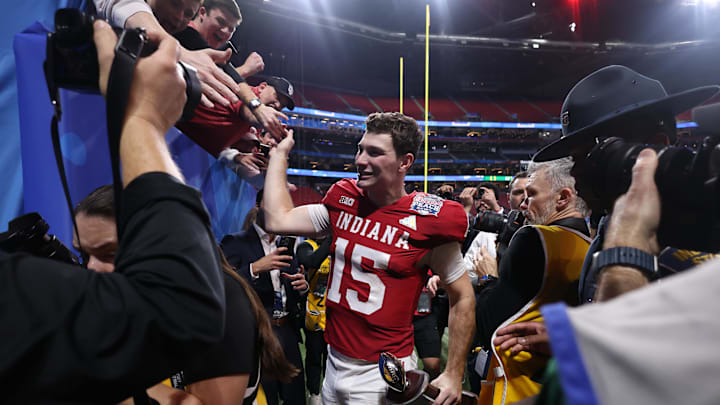 Jan 9, 2026; Atlanta, GA, USA; Indiana Hoosiers quarterback Fernando Mendoza (15) walks off the field after the 2025 Peach Bowl and semifinal game of the College Football Playoff at Mercedes-Benz Stadium. Mandatory Credit: Brett Davis-Imagn Images