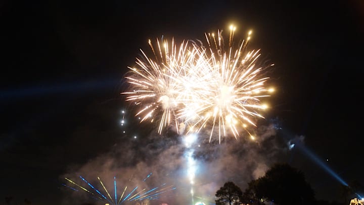 Fireworks explode above the lake around World Showcase at Epcot. Photo by Brian Miller