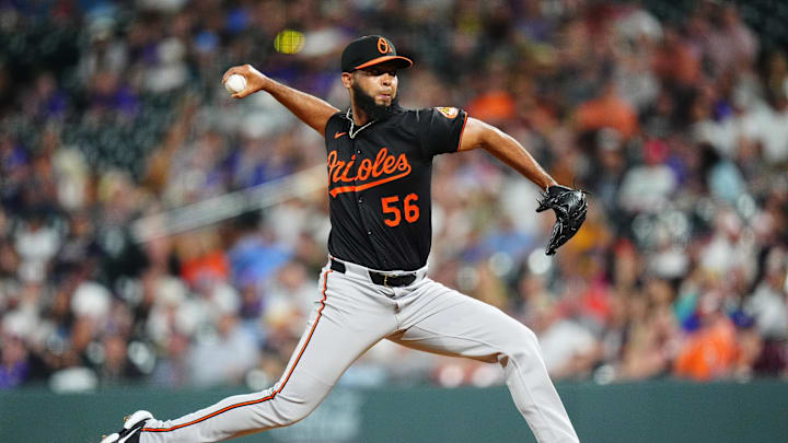Aug 30, 2024; Denver, Colorado, USA; Baltimore Orioles relief pitcher Seranthony Dominguez (56) delivers a pitch in the ninth inning against the Colorado Rockies at Coors Field.