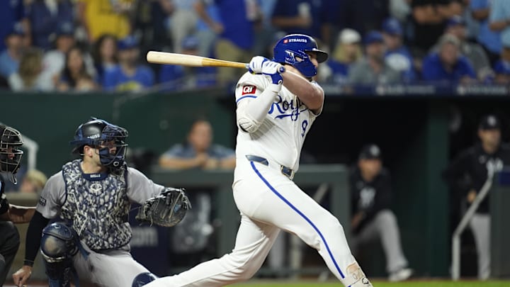 Kansas City Royals first baseman Vinnie Pasquantino (9) hits an RBI double during the sixth inning against the New York Yankees during game four of the ALDS for the 2024 MLB Playoffs at Kauffman Stadium.
