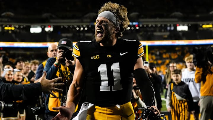 Iowa Hawkeyes quarterback Mark Gronowski (11) celebrates after defeating the Penn State Nittany Lions 25-24 Oct. 18, 2025 at Kinnick Stadium in Iowa City, Iowa.