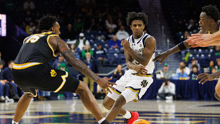Notre Dame guard Markus Burton, center, passes the ball during a NCAA men's basketball game against Missouri at Purcell Pavilion on Tuesday, Dec. 2, 2025, in South Bend. Notre Dame guard Markus Burton, center, passes the ball during a NCAA men's basketball game against Missouri at Purcell Pavilion on Tuesday, Dec. 2, 2025, in South Bend.