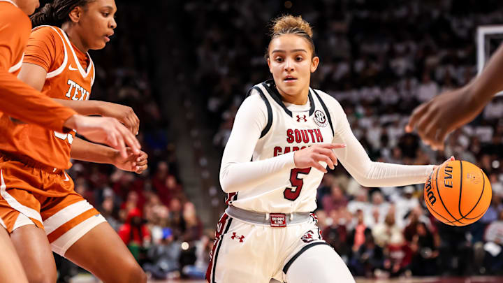 Jan 15, 2026; Columbia, South Carolina, USA; South Carolina Gamecocks guard Tessa Johnson (5) drives against the Texas Longhorns in the first half at Colonial Life Arena. Mandatory Credit: Jeff Blake-Imagn Images