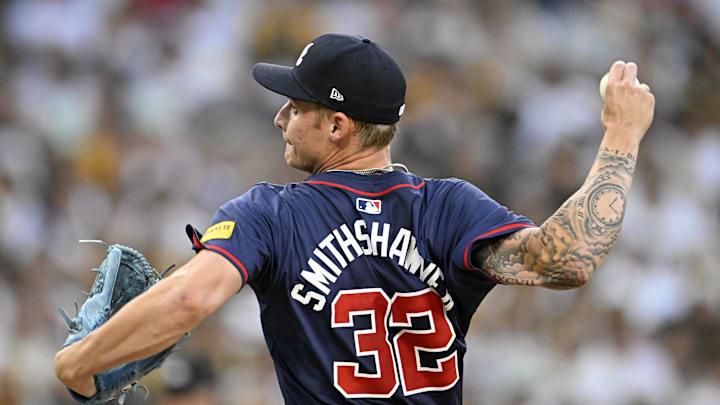 Oct 1, 2024; San Diego, California, USA; Atlanta Braves pitcher AJ Smith-Shawver (32) throws a pitch against the San Diego Padres during the second inning in game one of the Wildcard round for the 2024 MLB Playoffs at Petco Park. Mandatory Credit: Denis Poroy-Imagn Images